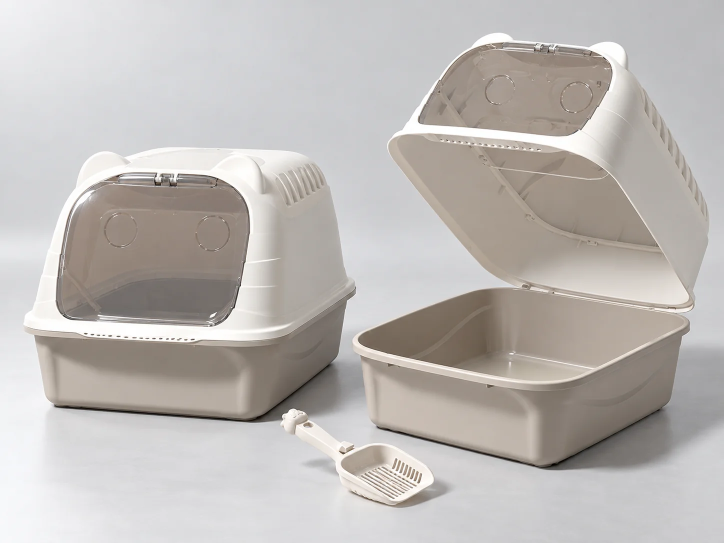 Two light-colored hooded cat litter boxes, one assembled with a smoked front door and one opened to reveal the base and interior