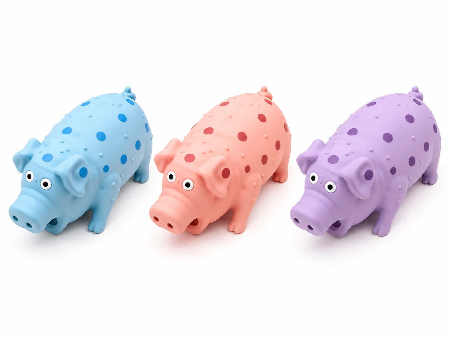 Three pig-shaped dog chew toys in pastel blue, pink and purple shown as different color samples