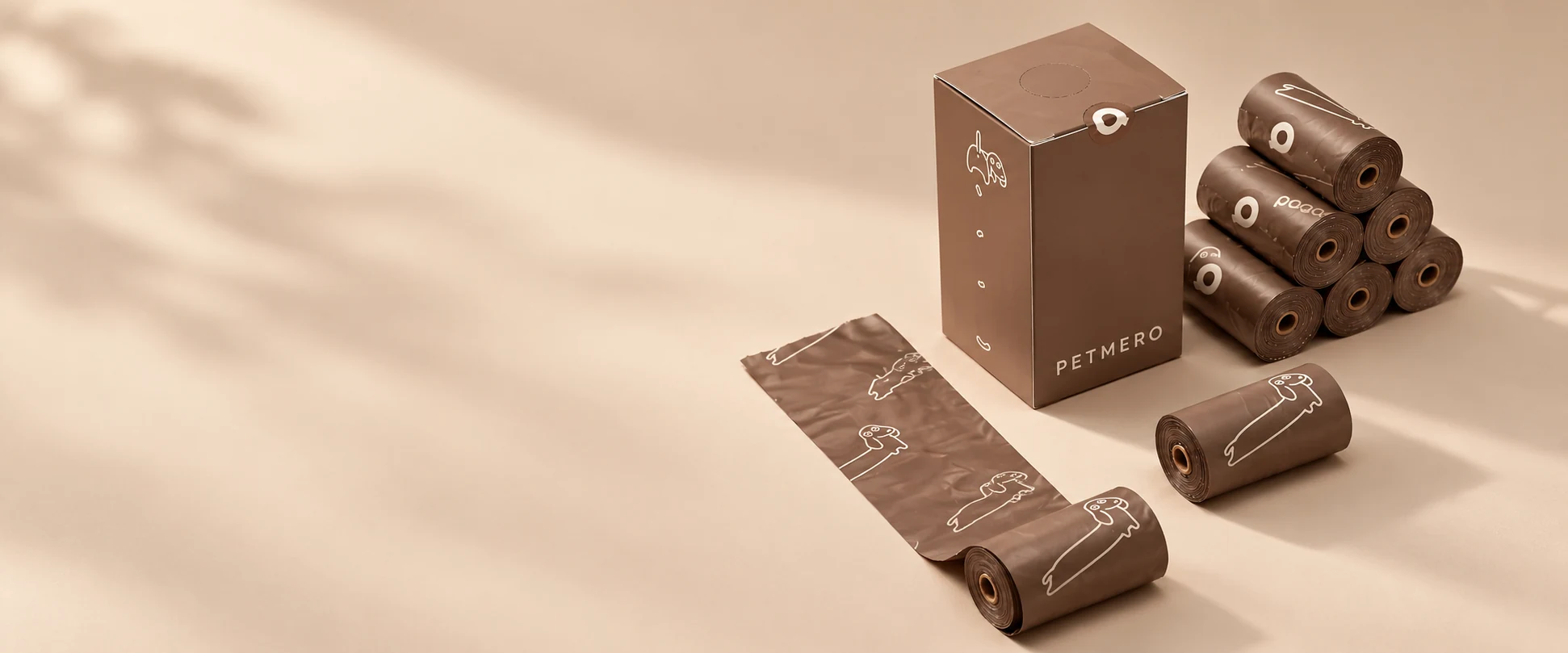 Brown dog poop bag rolls and packaging.